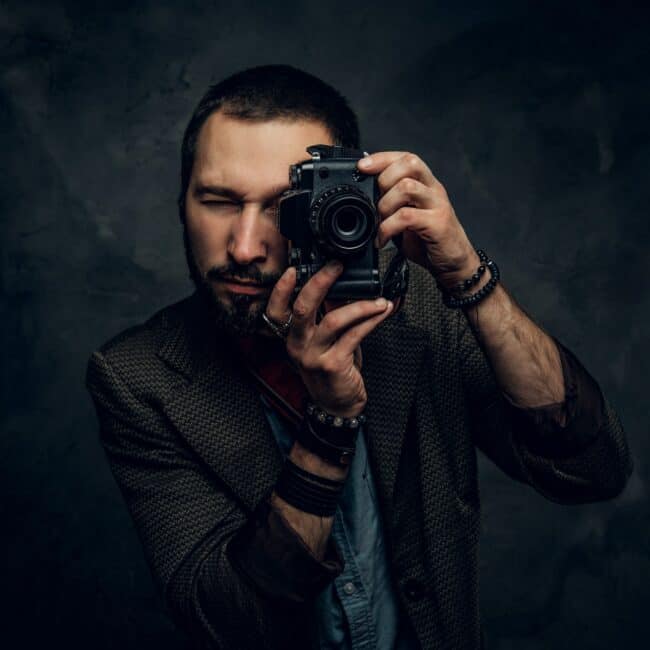 Reporter is taking a photo at photo studio